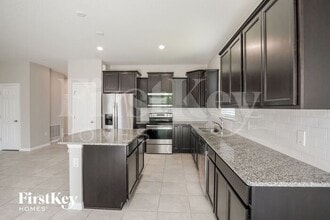 1869 Cayman Cove Cir in St. Cloud, FL - Building Photo - Building Photo