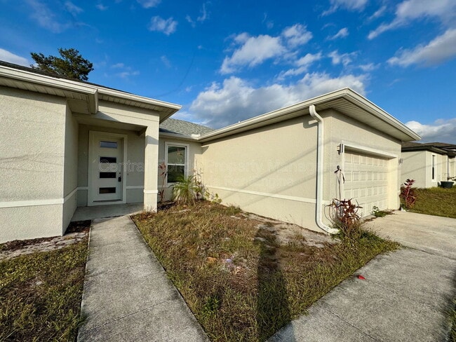9 Orchid Ln in Poinciana, FL - Building Photo - Building Photo