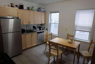 116 Adams St, Unit 3 in Boston, MA - Foto de edificio - Building Photo