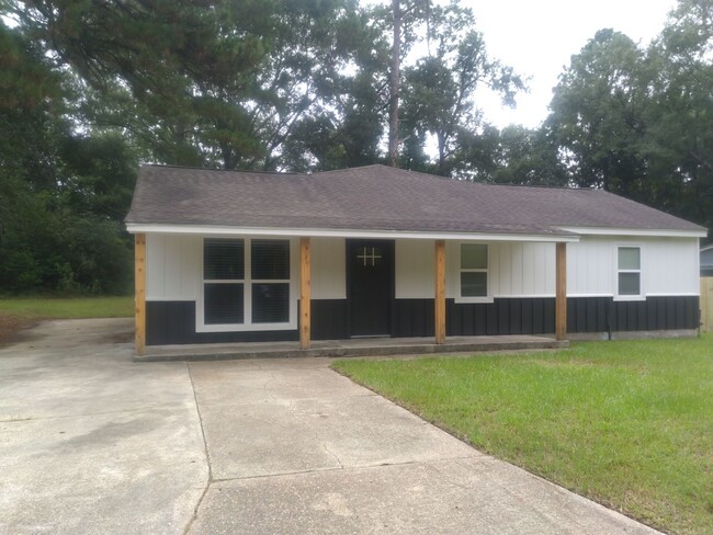 property at 214 Pine Tree Ln
