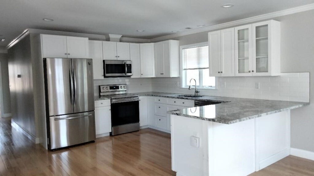 21 Lincoln St-Unit -2 in Reading, MA - Foto de edificio