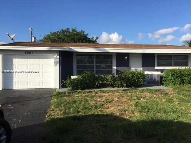 property at 9061 NW 25th Ct