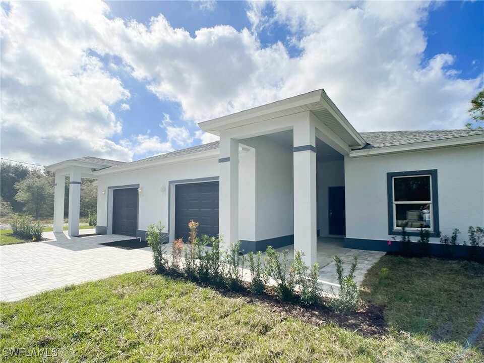 713 Jack Ave S in Lehigh Acres, FL - Building Photo