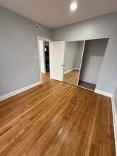 4921 W Addison St, Unit 1 in Chicago, IL - Foto de edificio - Building Photo