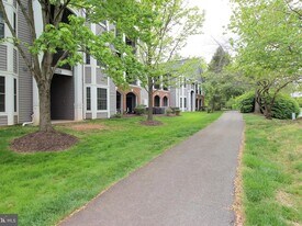 46602 Ellicott Sq, Unit 103 in Potomac Falls, VA - Building Photo