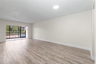 8705 NW 38th Dr in Coral Springs, FL - Building Photo - Building Photo