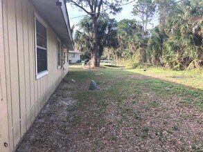 232 Bamboo Dr in Port Charlotte, FL - Building Photo - Building Photo