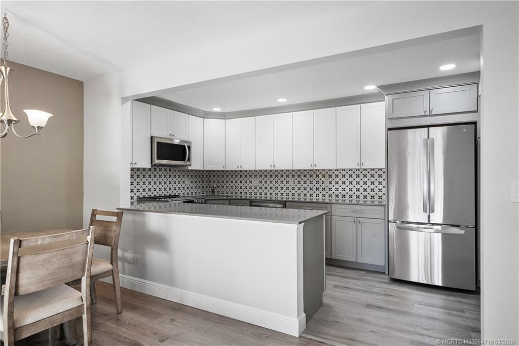 1935 SW Silver Pine Way in Palm City, FL - Building Photo