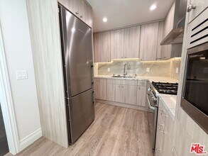 9595 W Olympic Blvd in Beverly Hills, CA - Building Photo - Building Photo