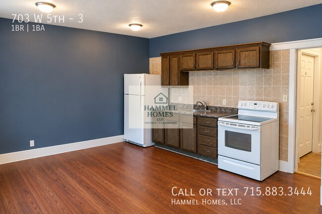 property at 703 W 5th St