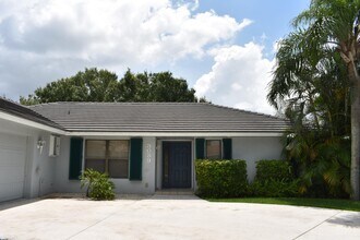 3039 SW Seaboard Ave in Palm City, FL - Building Photo - Building Photo