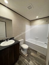 1023 E 9th St in Mountain Home, AR - Foto de edificio - Building Photo