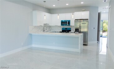 2404-2406 Crawford Ave N in Lehigh Acres, FL - Building Photo - Building Photo