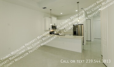 141 Harold Ave S in Lehigh Acres, FL - Building Photo - Building Photo