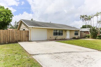 3020 Caribb Wy in Atlantis, FL - Building Photo - Building Photo