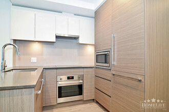 13615 Fraser Hwy in Surrey, BC - Building Photo - Building Photo