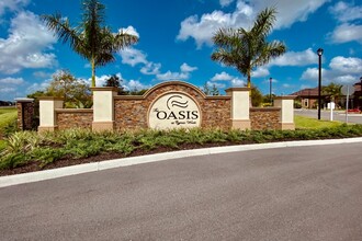 The Oasis at Cypress Woods in Ft. Myers, FL - Building Photo - Building Photo