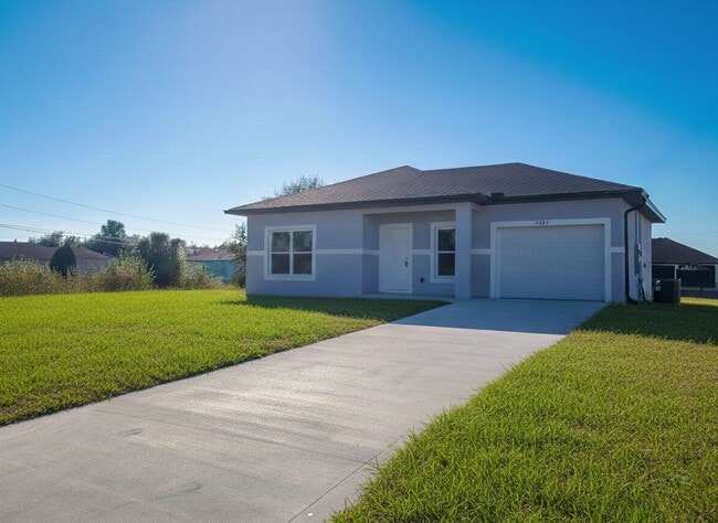 4702 Connie Ave S in Lehigh Acres, FL - Building Photo - Building Photo