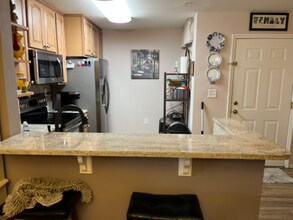 15433 Bellamar Cir, Unit 1015 in Ft. Myers, FL - Foto de edificio - Building Photo