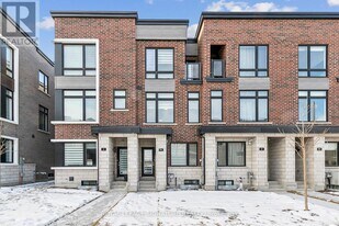 65 Akil Thomas Gdns in Toronto, ON - Building Photo