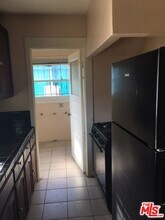 4615 S Gramercy Pl in Los Angeles, CA - Building Photo - Building Photo