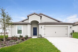 1677 Hideaway Flat St in Mascotte, FL - Building Photo