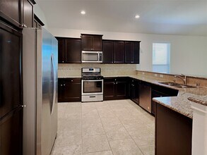 21614 Champagne Dr E in Porter, TX - Building Photo - Building Photo
