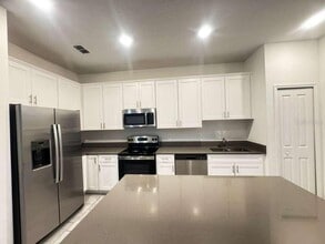 7465 Stone Crk Trl in Kissimmee, FL - Building Photo - Building Photo