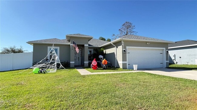 2129 Hibiscus Pl in Poinciana, FL - Building Photo - Building Photo