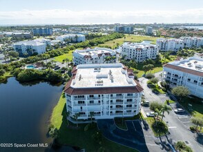 8935 Puerto Del Rio Dr in Cape Canaveral, FL - Building Photo - Building Photo