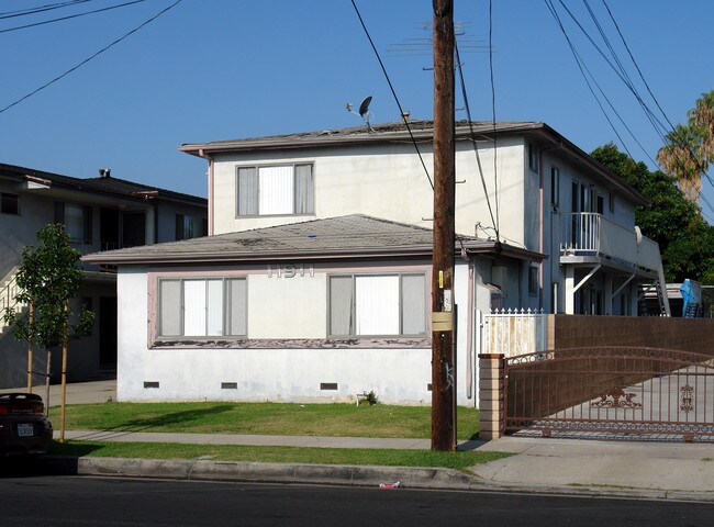11911 Grevillea Ave in Hawthorne, CA - Foto de edificio - Building Photo