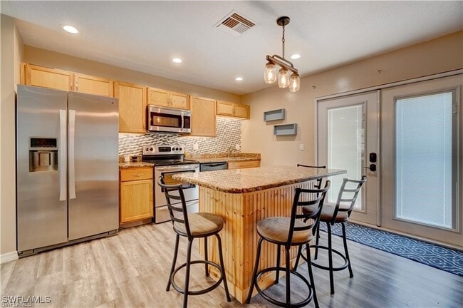 property at 551 Golden Gate Blvd W