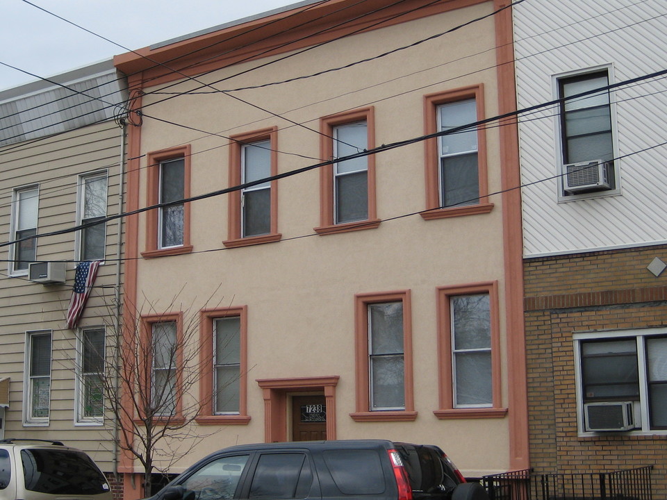 7238 Cooper Ave in Flushing, NY - Building Photo