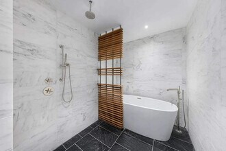 100 Vandam St in New York, NY - Building Photo - Building Photo