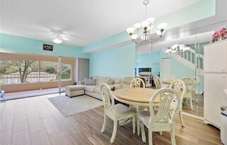 1018 Woodshire Ln, Unit A208 in Naples, FL - Building Photo