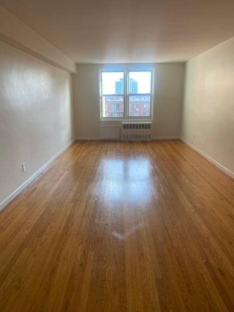 property at 66-01 Burns St