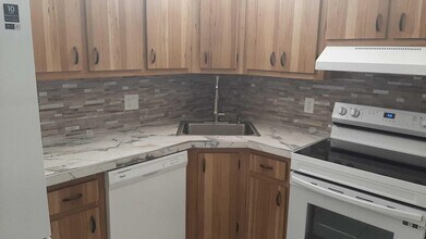 5990 Pine Cone Ct in Greenacres, FL - Building Photo - Building Photo