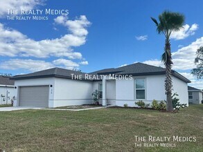 310 Drum Ct in Poinciana, FL - Building Photo - Building Photo