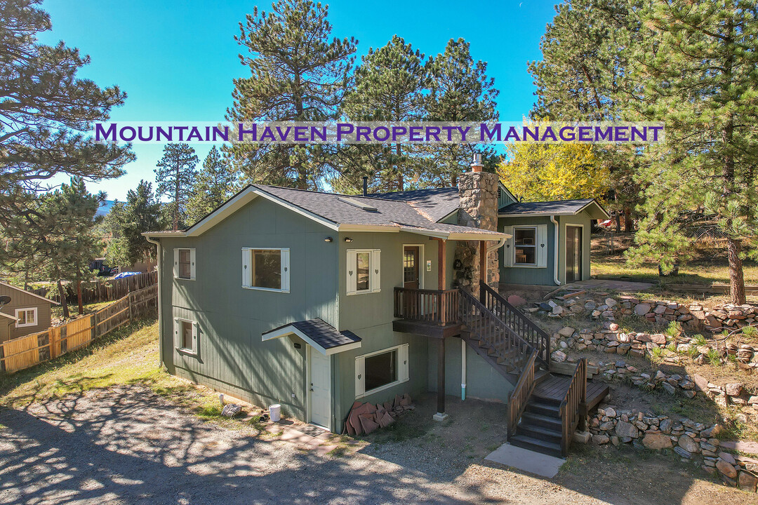 27897 Pine Dr in Evergreen, CO - Foto de edificio