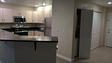 1986 S University Blvd, Unit 103 in Denver, CO - Building Photo - Building Photo