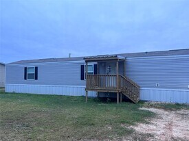 1668 Farm to Market 2518 in Cleveland, TX - Building Photo