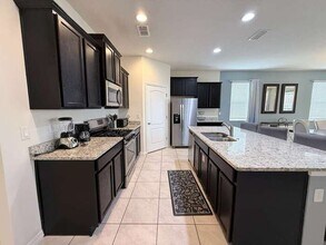 8032 Oak Shadow Ct in Davenport, FL - Building Photo - Building Photo