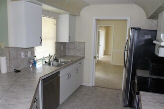 1114 Presque Isle Dr in Port Charlotte, FL - Building Photo - Building Photo