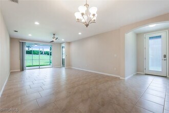 14533 Edgewater Cir in Naples, FL - Building Photo - Building Photo