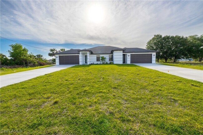 338 Harry Ave S in Lehigh Acres, FL - Building Photo - Building Photo