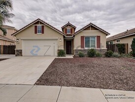 1584 Manzanita Way in Los Banos, CA - Building Photo