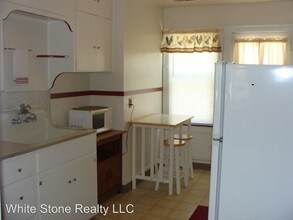 309 9th St in Rawlins, WY - Foto de edificio - Building Photo