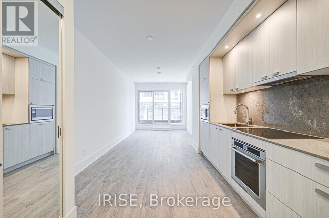 property at 115-115 Denison Ave