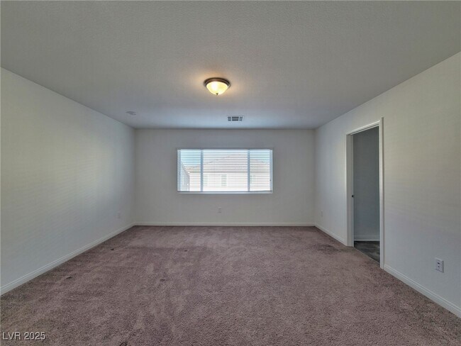 7736 S Westwind Rd in Las Vegas, NV - Building Photo - Building Photo