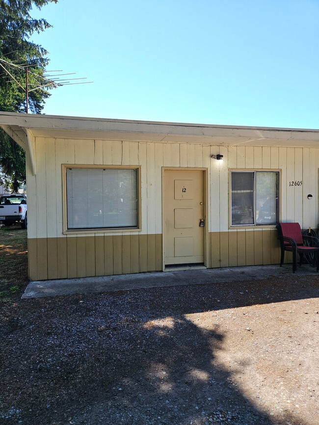 property at 12605 Pacific Ave S